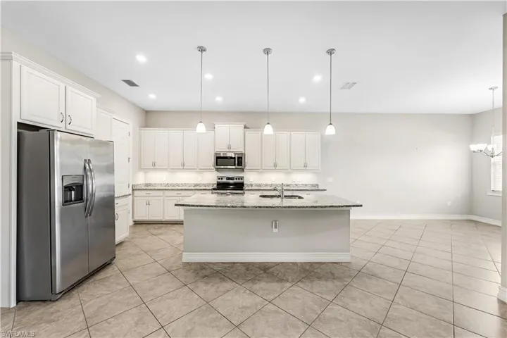 Wood cabinets & stainless steel appliances in your Gourmet Kitchen