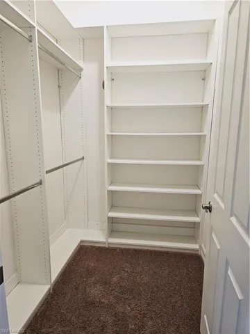 Master bedroom closets by Closets by Design