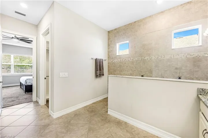 Master Bath with his/hers walkin closets redone by Closets by Design