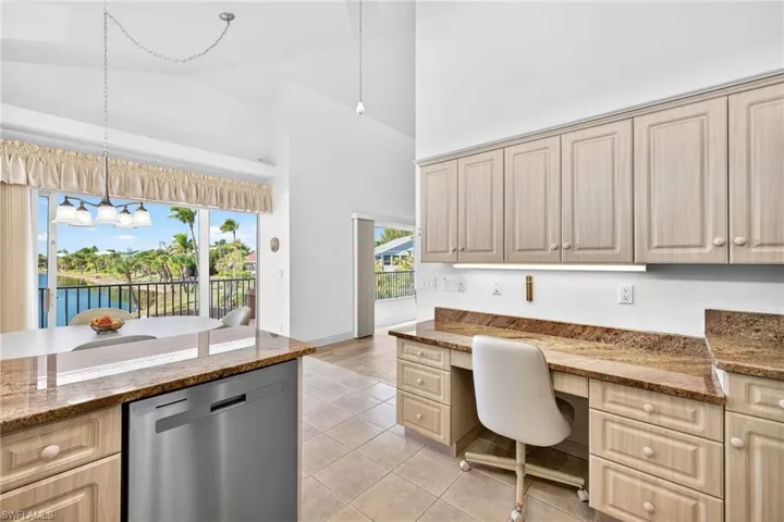 Kitchen with built in desk .