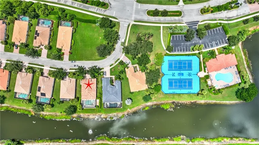 Club house pool and tennis area; note how close this home is to this amenity
