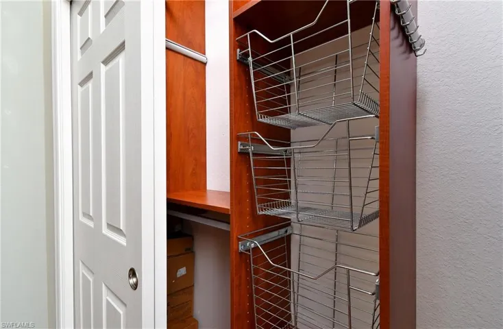 2nd BR with California closet shelves and drawers.