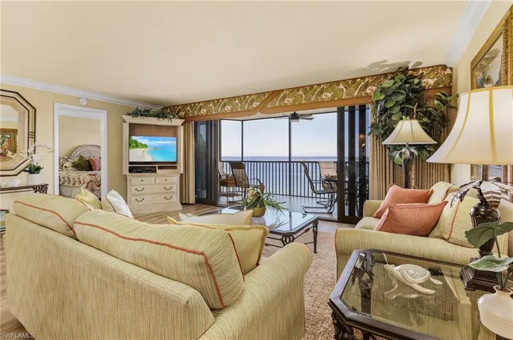 Living room featuring ornamental molding