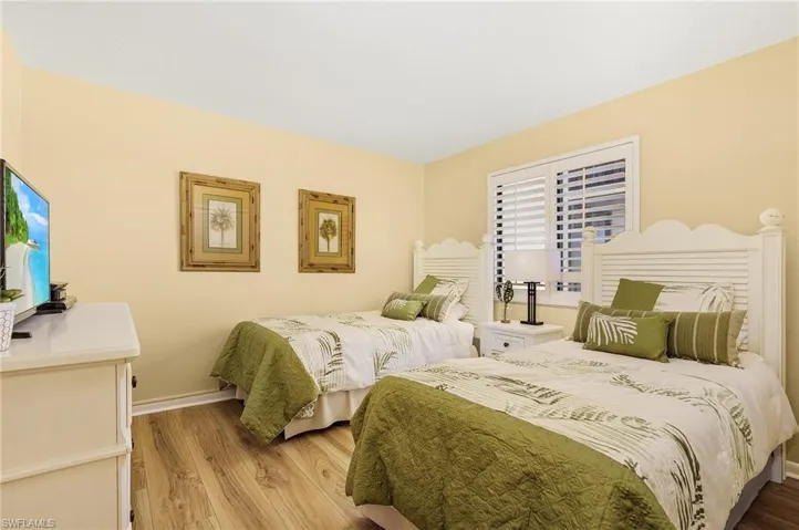 Bedroom with light wood-type flooring