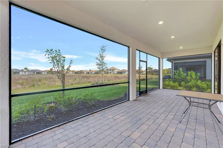 Unfurnished sunroom with a residential view