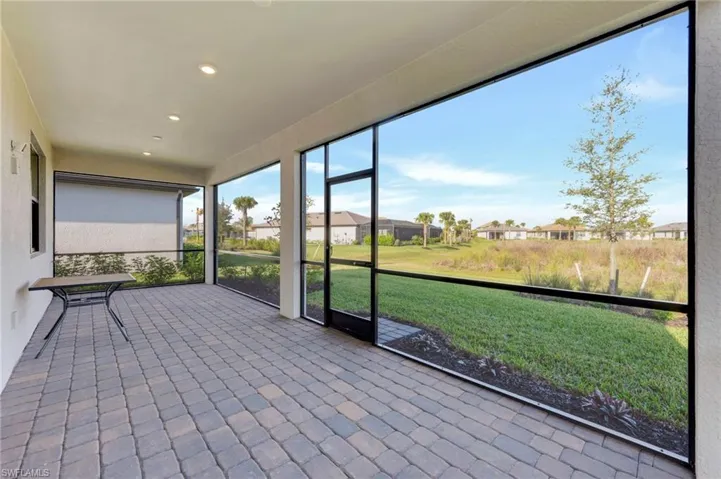 Unfurnished sunroom with a residential view