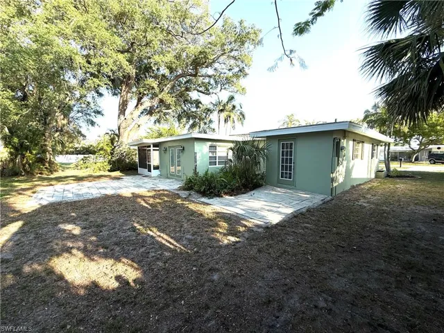Back of house with stucco siding
