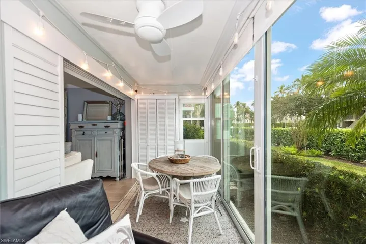 Sunroom featuring wood finished floors
