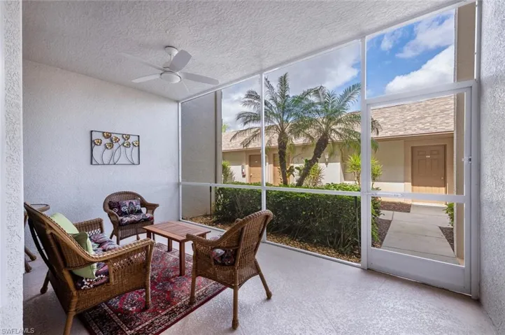 Sunroom with ceiling fan