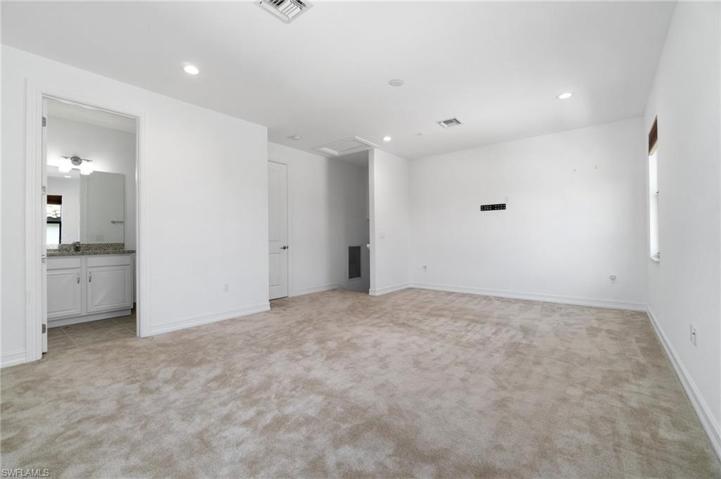 Upstairs bonus room with attached bathroom