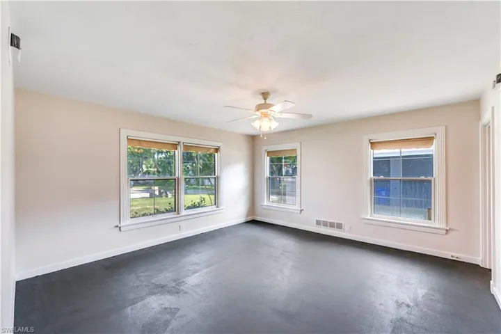 Unfurnished room with ceiling fan