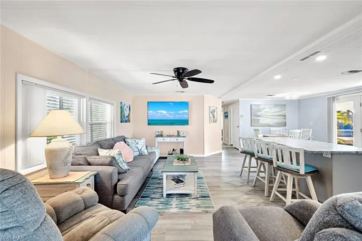 Spacious open-concept living area connecting the kitchen, dining, and family room for effortless entertaining.