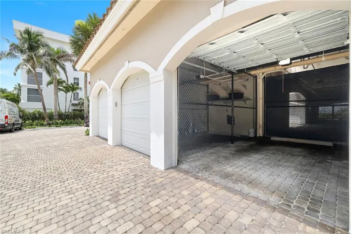 Covered single car deeded garage with garage door opener (key pad access outside).