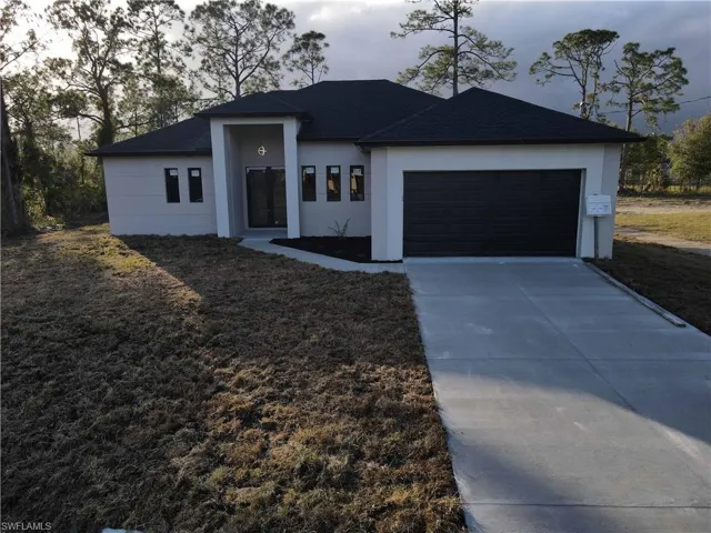 Prairie-style house with a garage