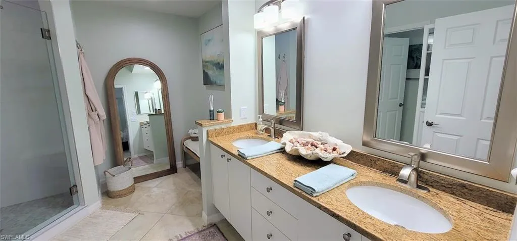 Dual vanities in primary bathroom