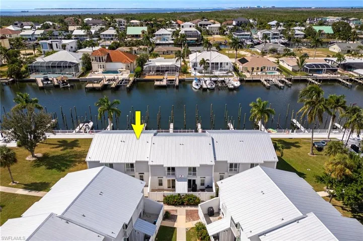 Aerial view of property location and marina