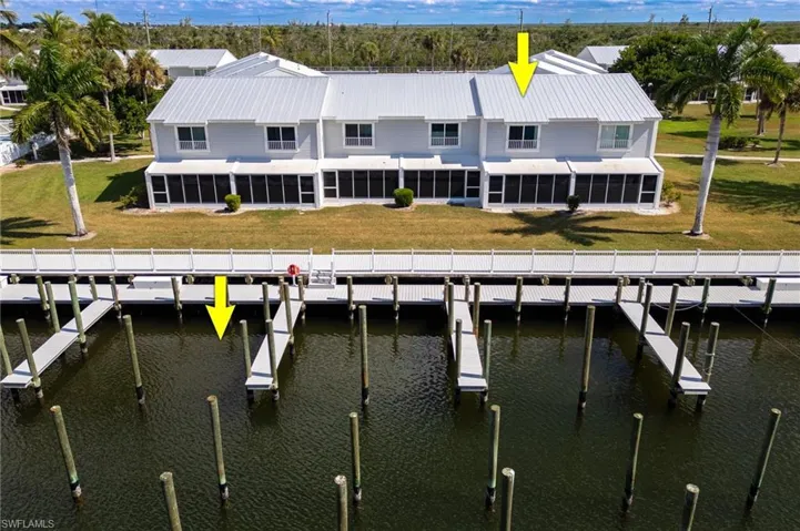Rear view of the property and boat slip location