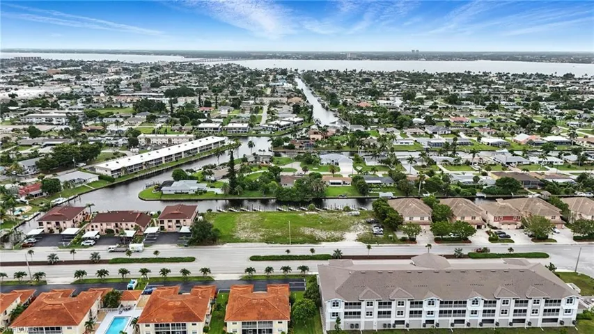 Aerial view of residential area with a nearby body of water