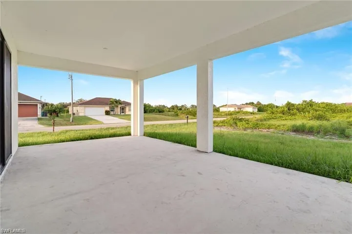 View of patio featuring a garage