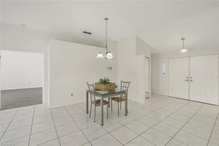 Dining area featuring a chandelier