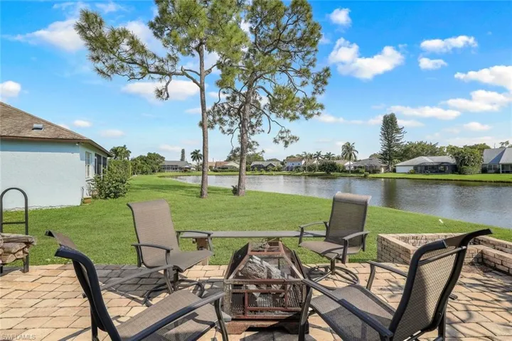 View of patio with a water view
