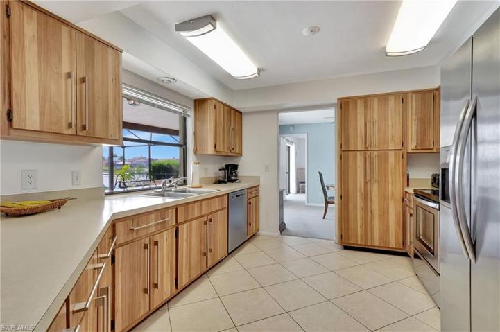 Large Window Overlooking Pool & Lake!