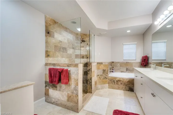 Separate shower and soaking tup in the master bath