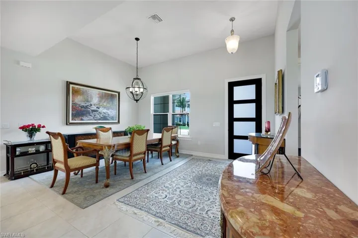 FORMAL DINING AREA WITH HIGH CEILINGS