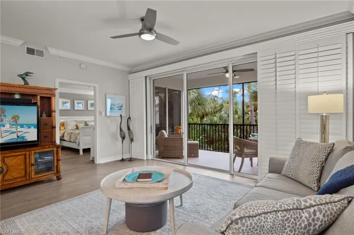 This beautiful condo also features crown molding and plantation shutters throughout.