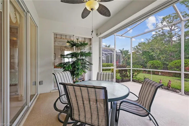 Screened Lanai with views of beautifully landscaped backyard.