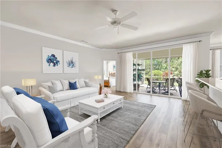 Virtual Photo with LVP Flooring and new drapes. Look at how beautiful this room transforms!