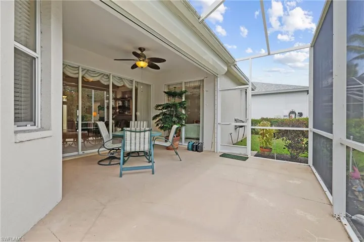 Spacious screened lanai with two screened doors to backyard.