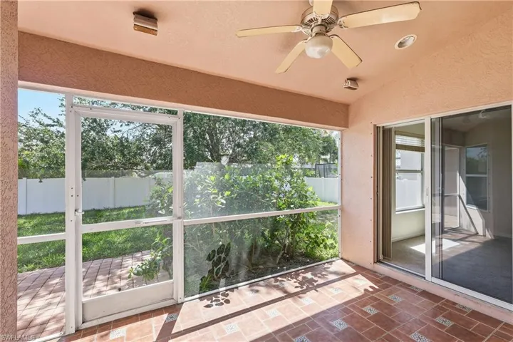 Rear screened lanai with tile floor