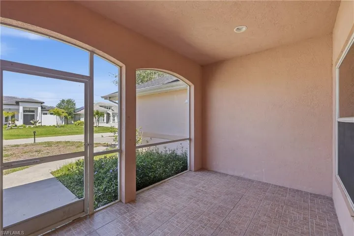 Screened and tiled front lanai.