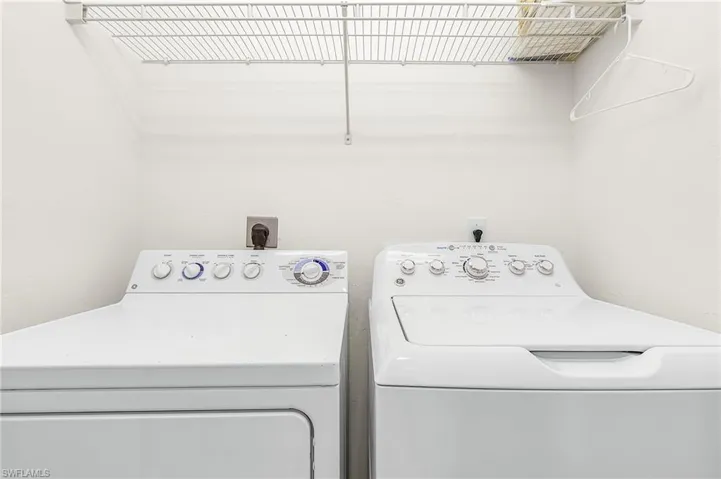 Laundry area featuring washing machine and dryer