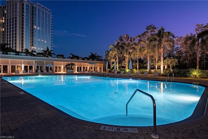 View of pool at dusk