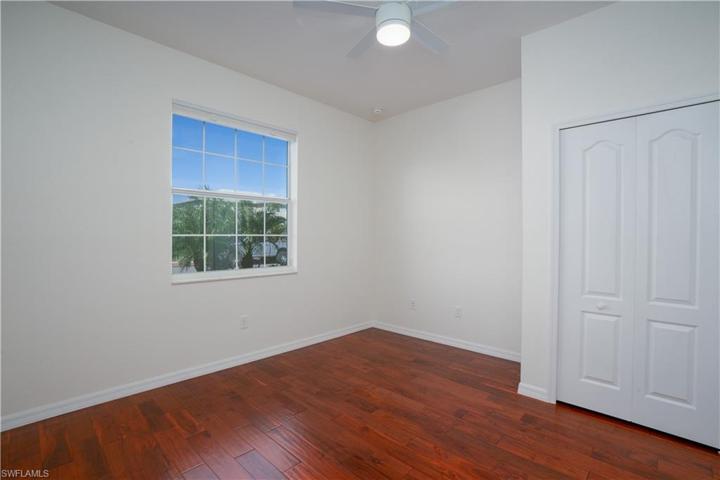 bedroom 3 with engineered hardwood floors