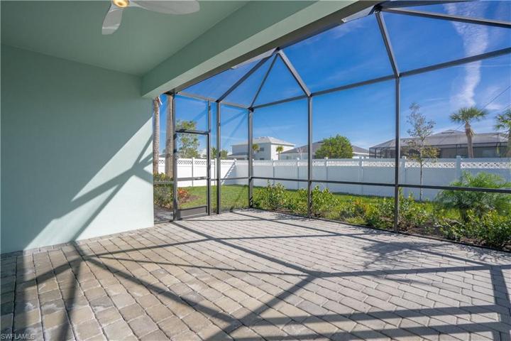 Extended lanai was added for additional living space outside your home.