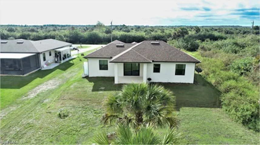 Aerial view of property and surrounding area