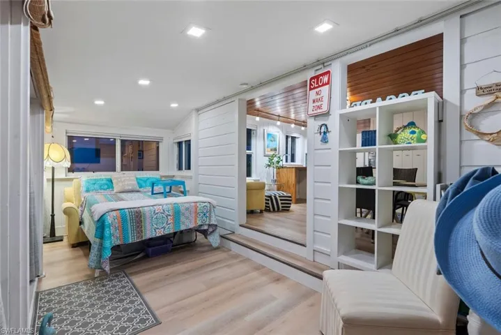 Bedroom with light wood-style floors