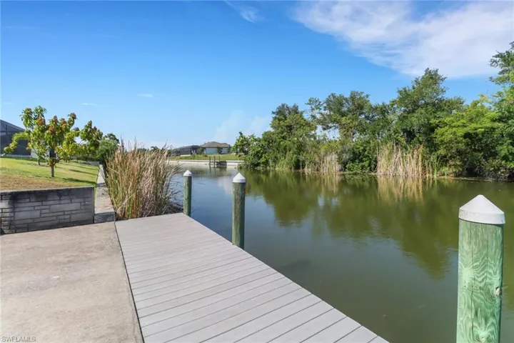Dock featuring a water view