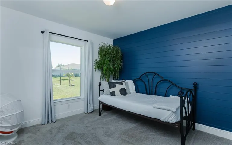 Bedroom with carpet floors
