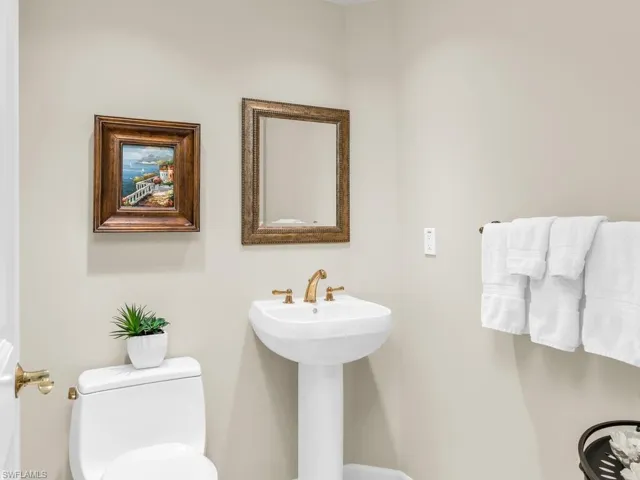 Bathroom featuring sink and toilet