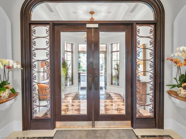 Doorway to property featuring french doors