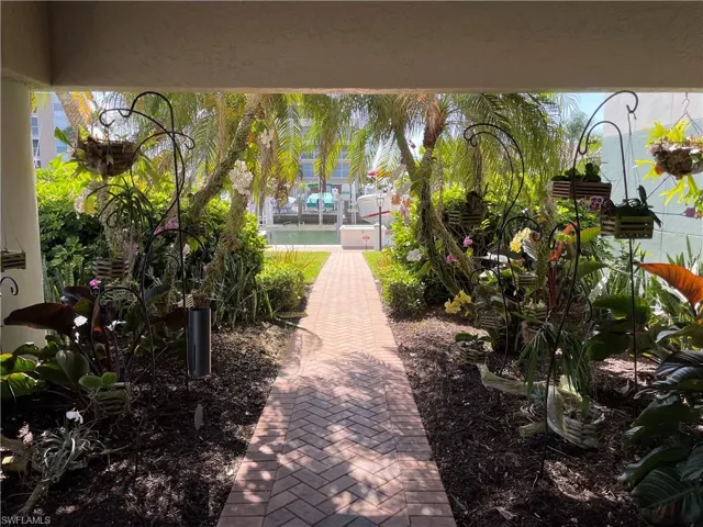 Beautiful orchid filled walkway to docks