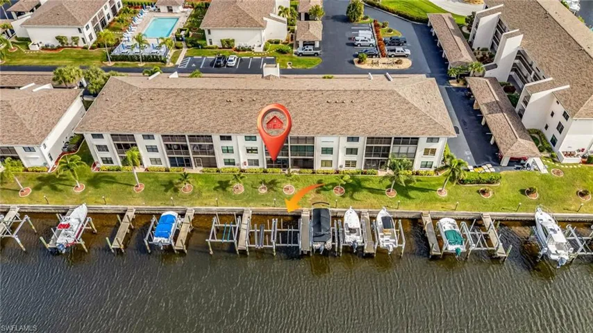 Aerial view of condo's location and nearby boat dock