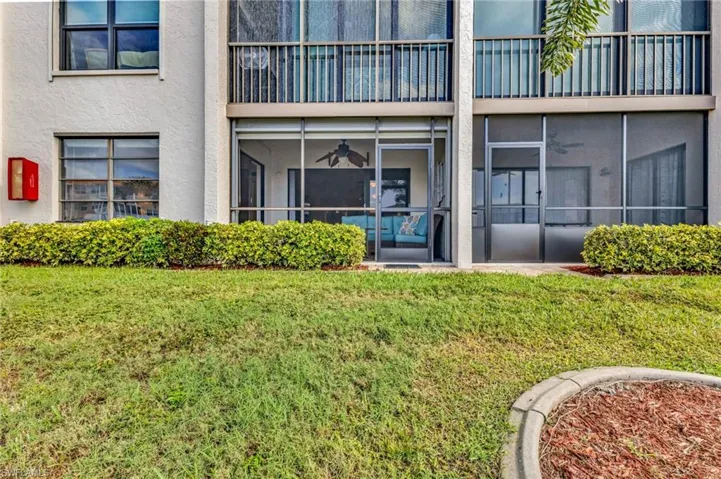 Rear view of condo and screened lanai