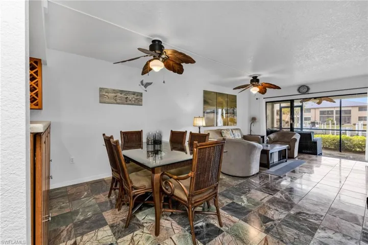 Dining area featuring extra 42" tall wood storage cabinets
