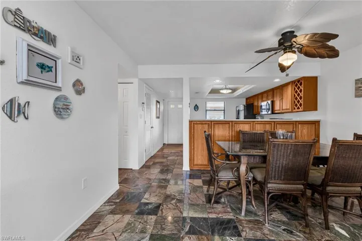 Dining area featuring extra 42" tall storage cabinets