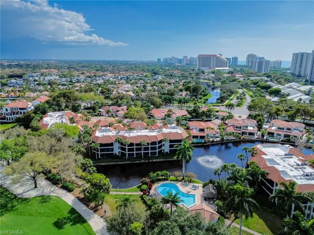 Bird's eye view of a nearby body of water and city skyline
